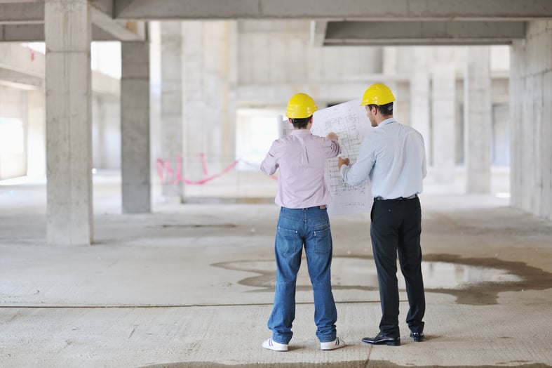 Team of business people in group, architect and engineer  on construction site check documents and business workflow on new building-1